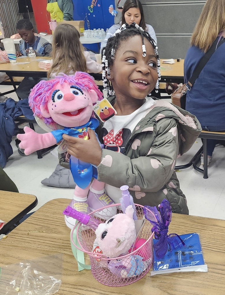 A student wins a prize at Bingo night.
