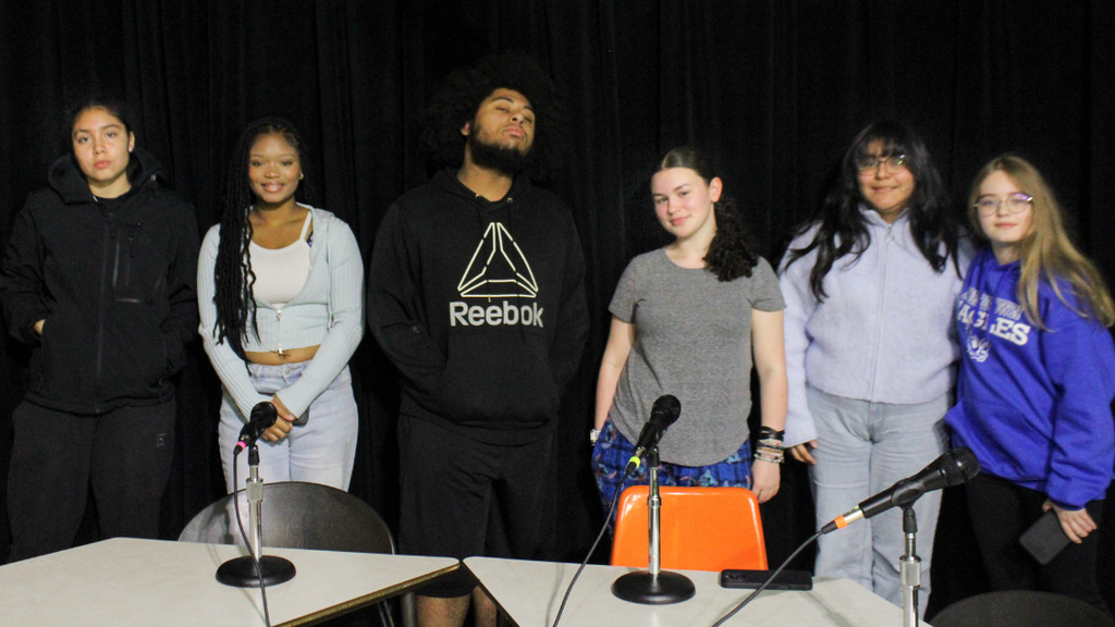 Six students from the podcasting club pose for group photo. 