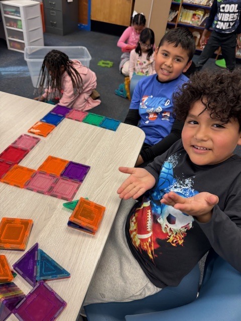 Students making the number 67