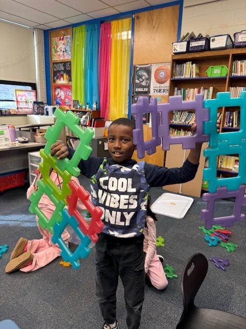 A student making the number 67