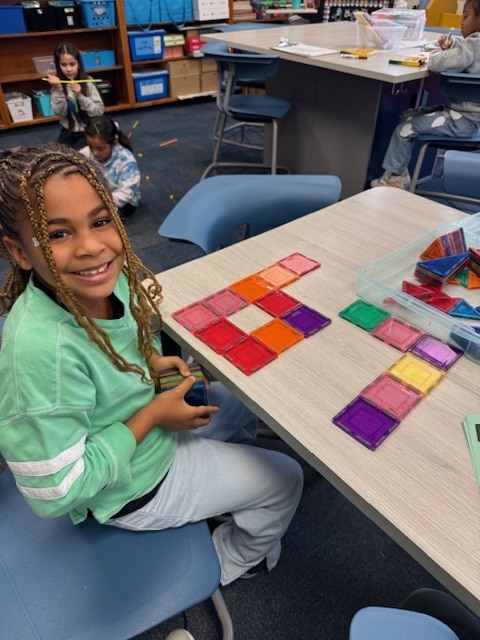 A student making the number 67