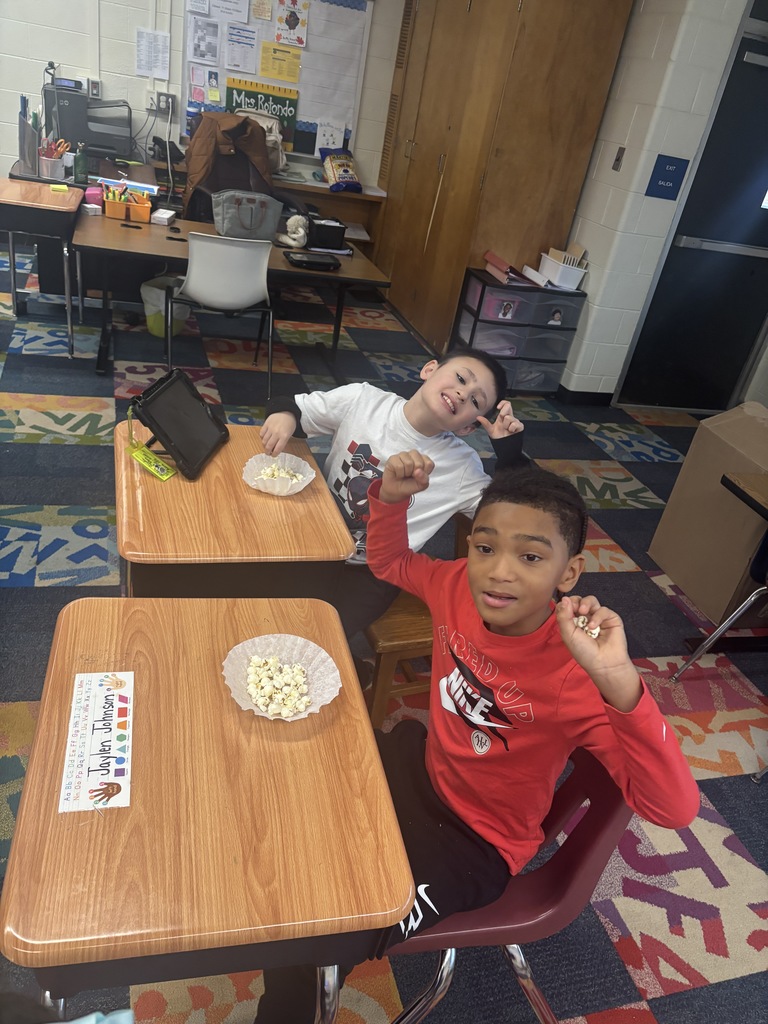 Students eating popcorn 