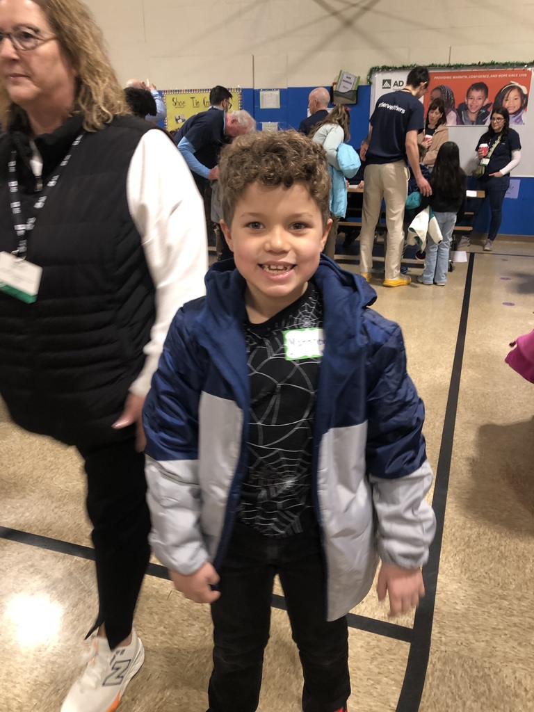 A student wearing his new coat