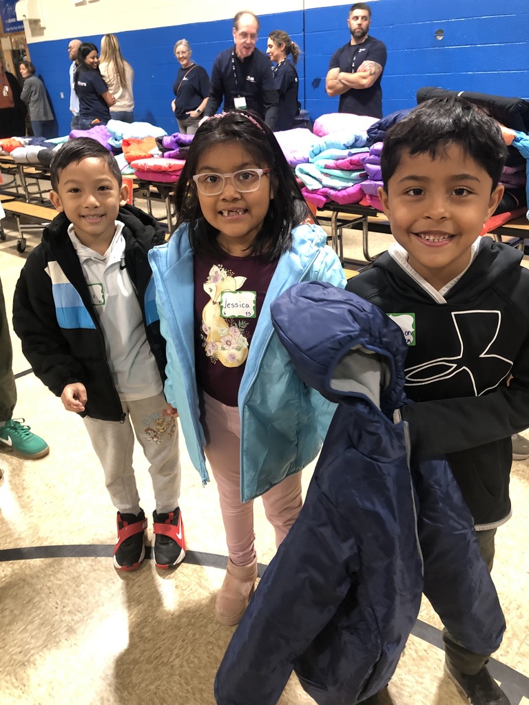 Three students with their new coats