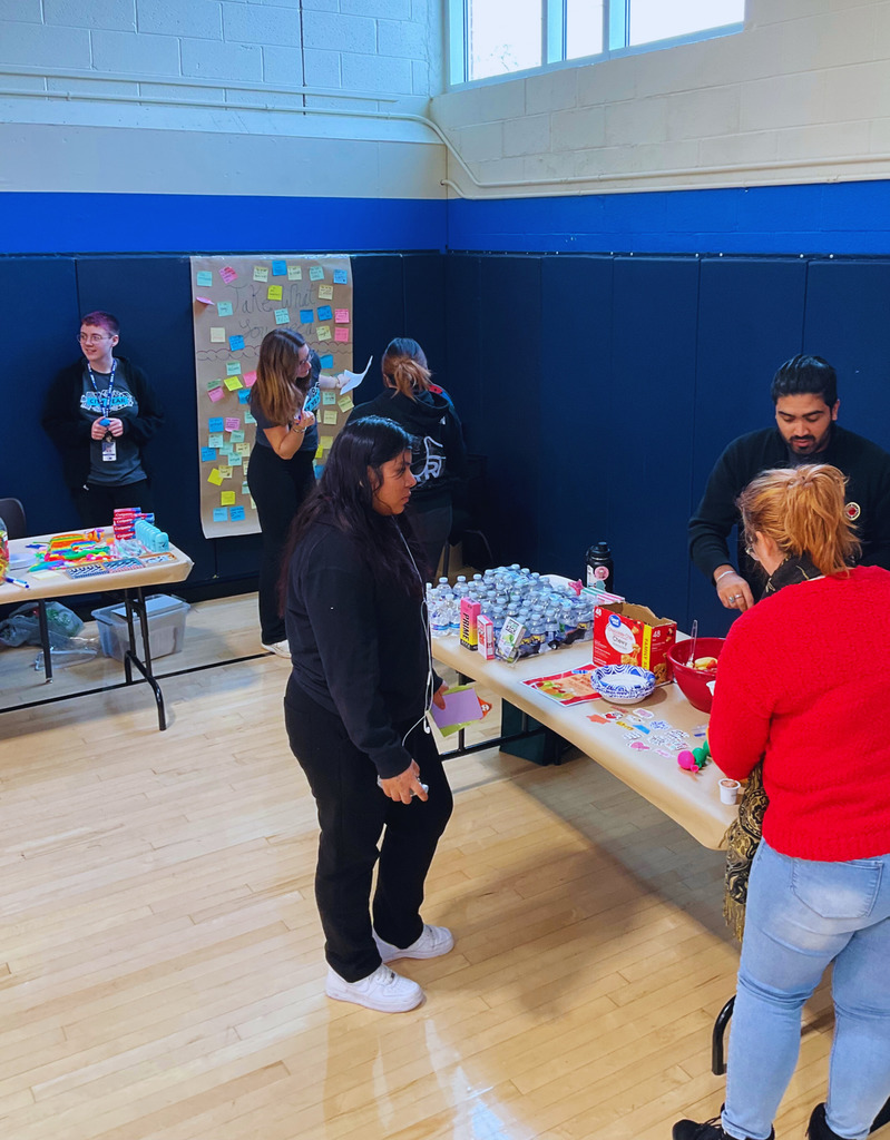 Students are working with city year coaches during the wellness fair