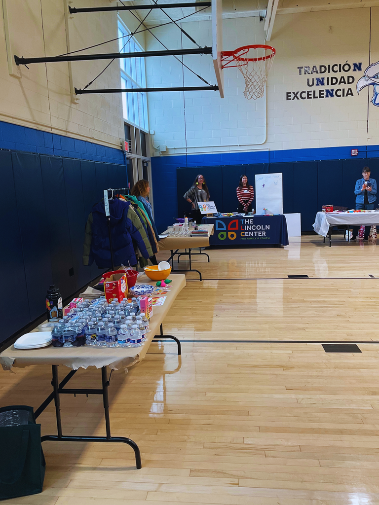 A photo of water and tables set up for the wellness fair