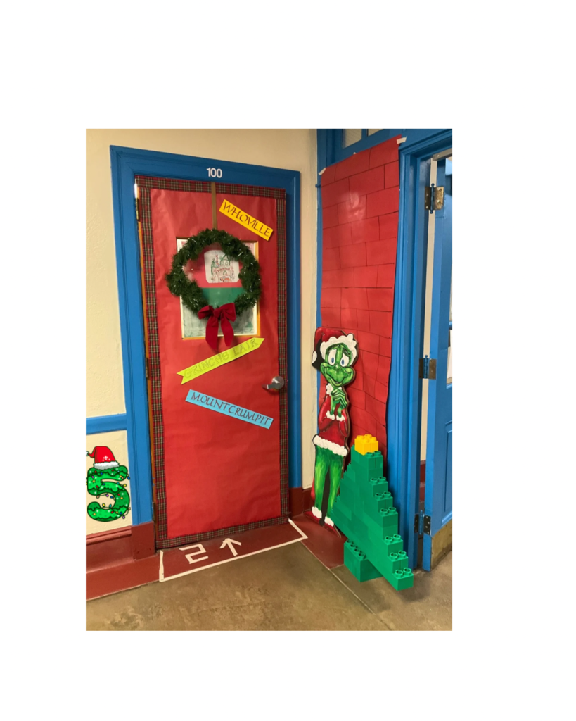 A door with the grinch decorations