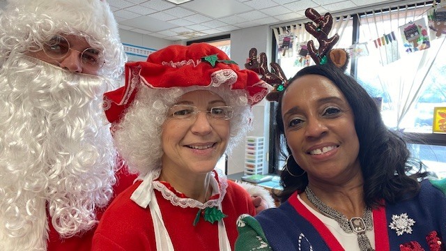 Santa, Mrs. Claus, and Dr. Kirksey.