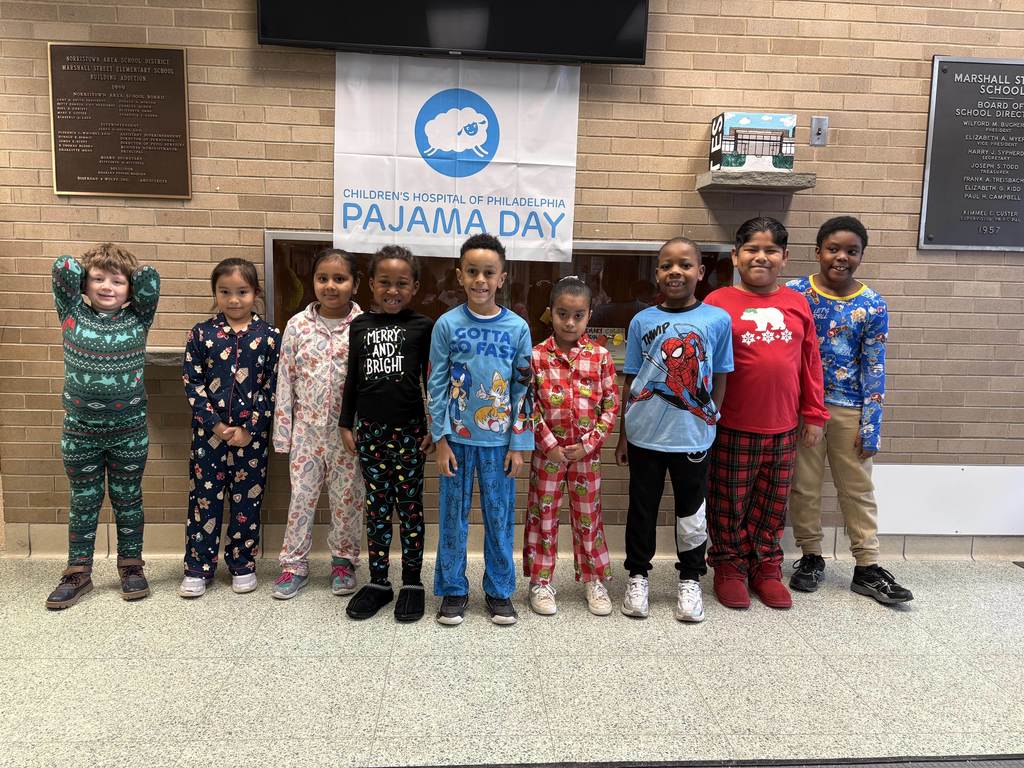 Students dressed in pajamas for CHOP Pajama Day fundraiser.