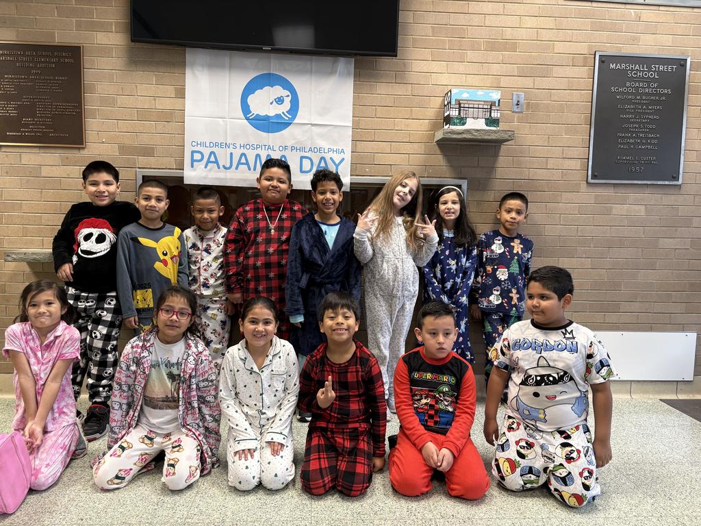 Students dressed in pajamas for CHOP Pajama Day fundraiser.