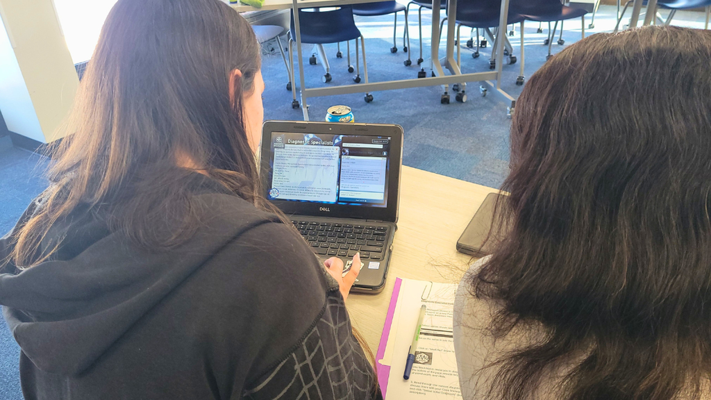 Students working on the mission on a chromebook.