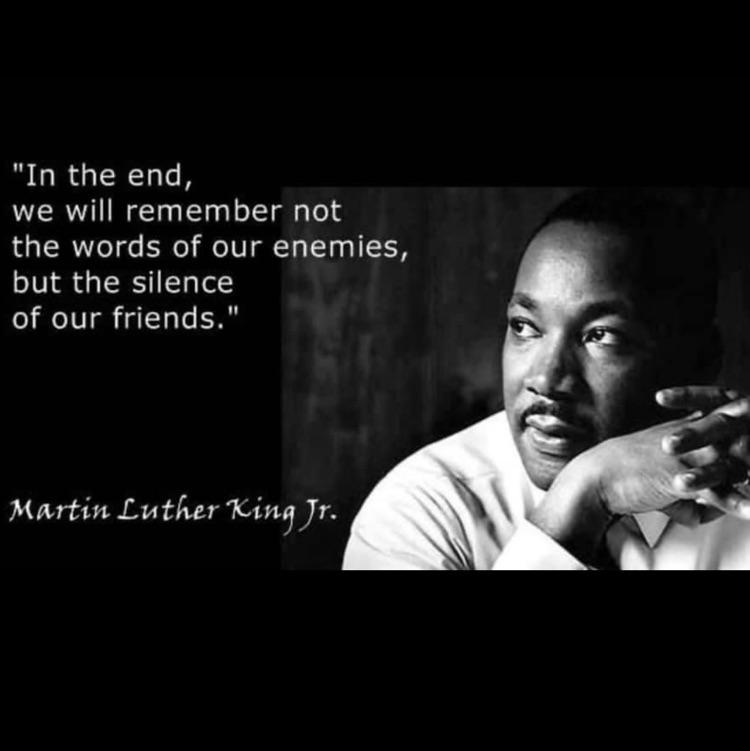 Black and white portrait with a quote attributed to Martin Luther King Jr. himself.