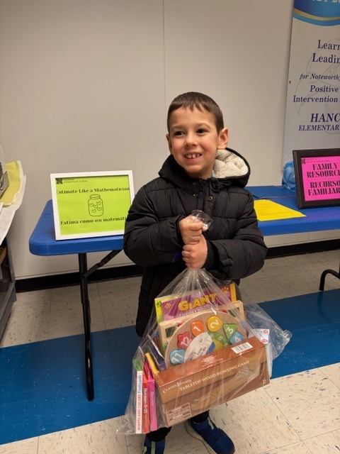 The winner of the raffle at family math night