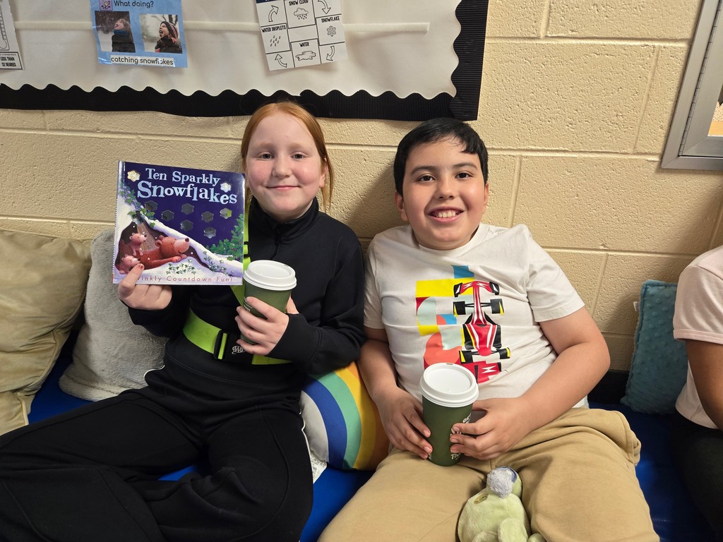 Best Buddies reading together.