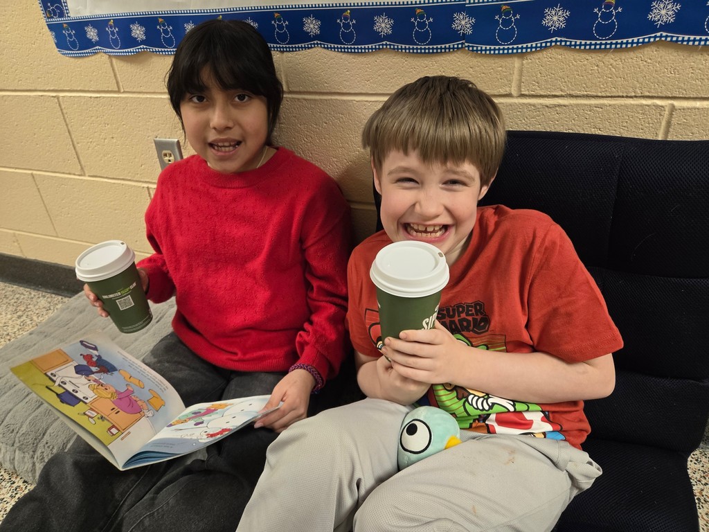 Best Buddies reading together.