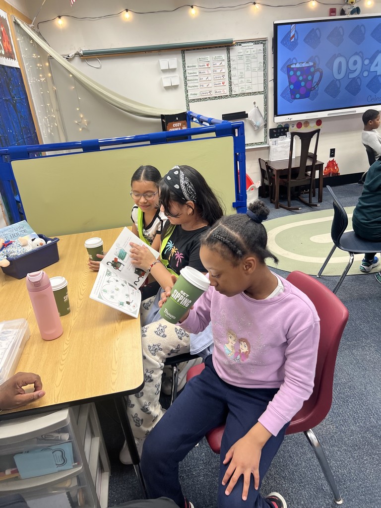 Best Buddies reading together.