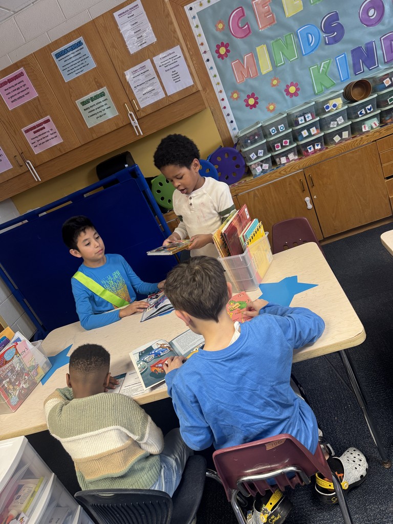 Best Buddies reading together.