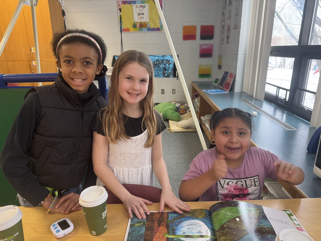 Best Buddies reading together.