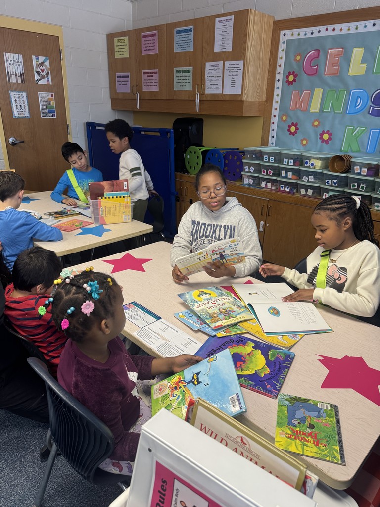 Best Buddies reading together.