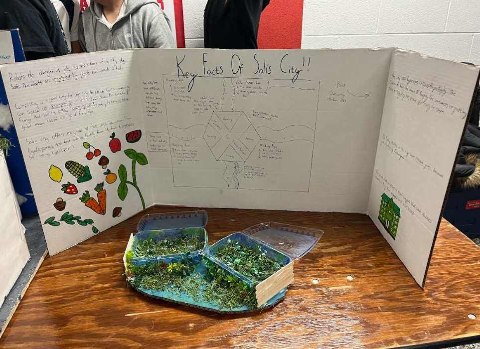 Trifold with info about 7th grade's future city model.