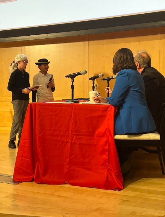 5th graders David Reiley and Giovanni Estarda presenting to the panel of judges.