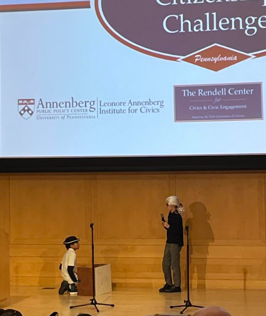 5th graders David Reiley and Giovanni Estarda presenting to the panel of judges.