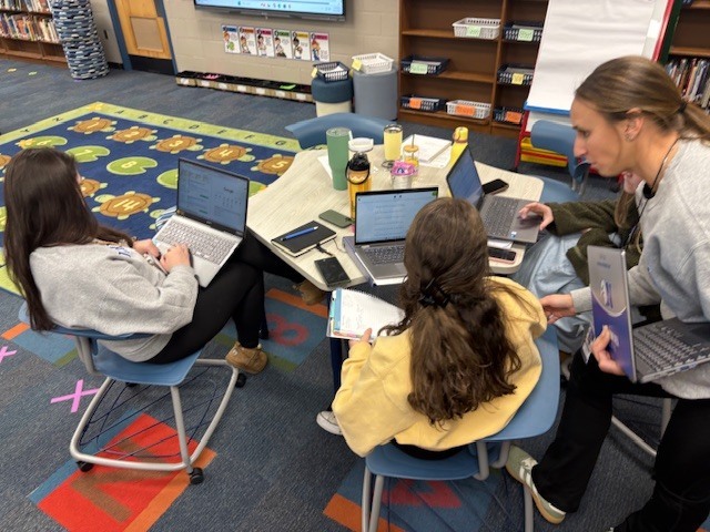 Staff discussing data. 