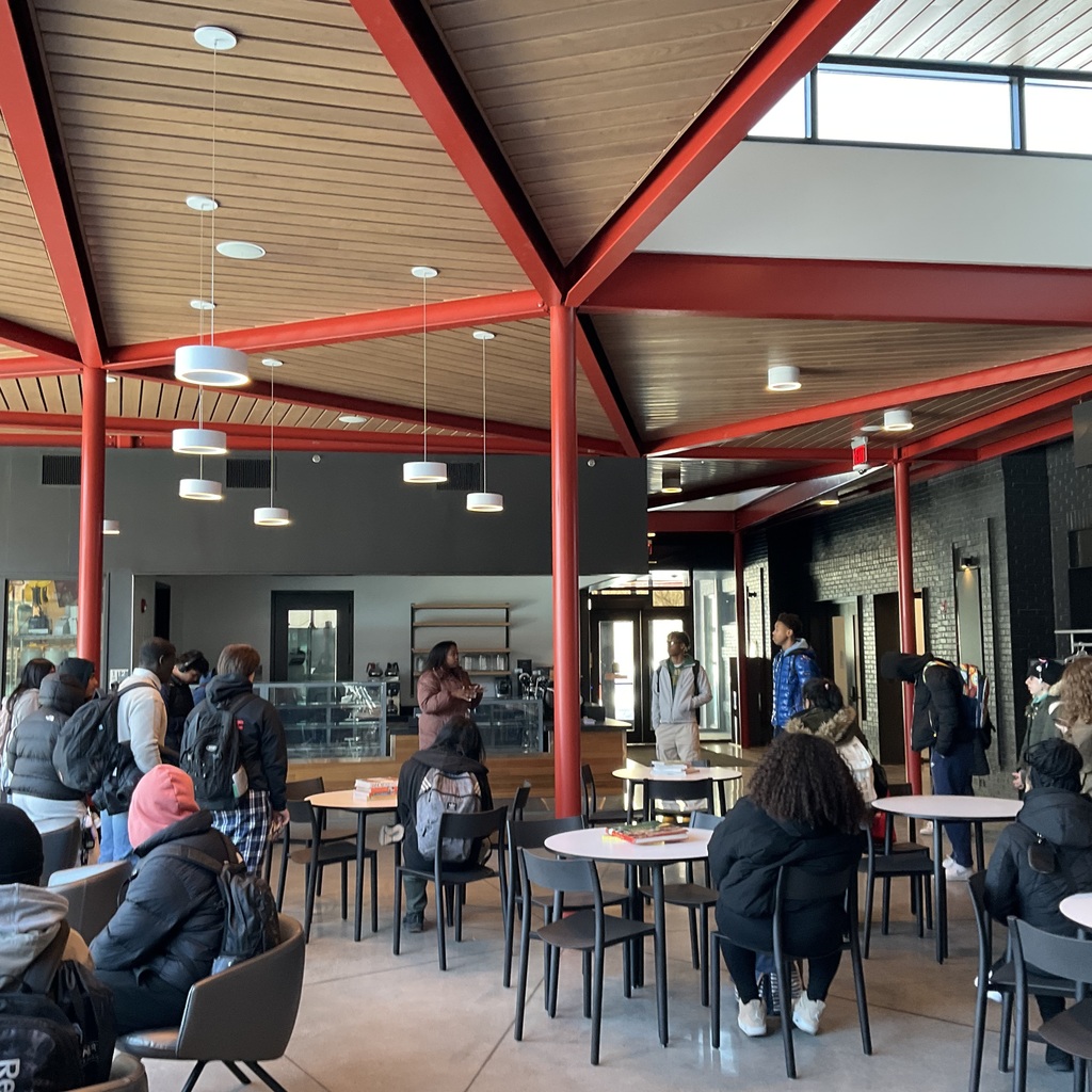 Students exploring the hospitality center