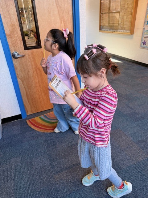 1st Grade Students Writing 100 Words