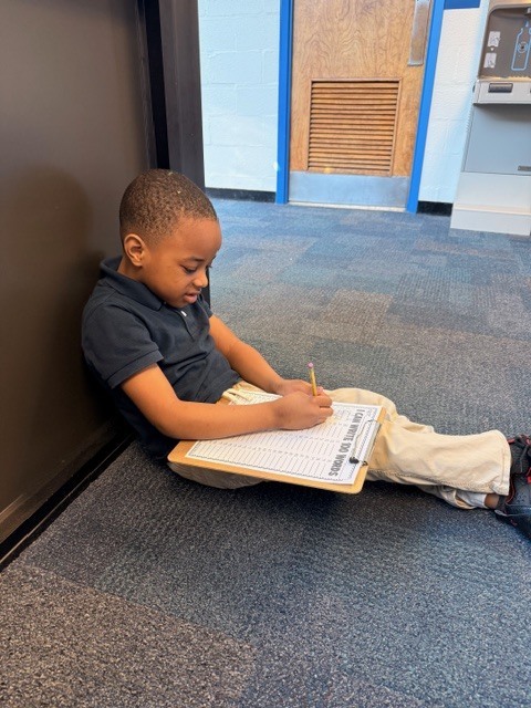 1st Grade Student Writing 100 Words