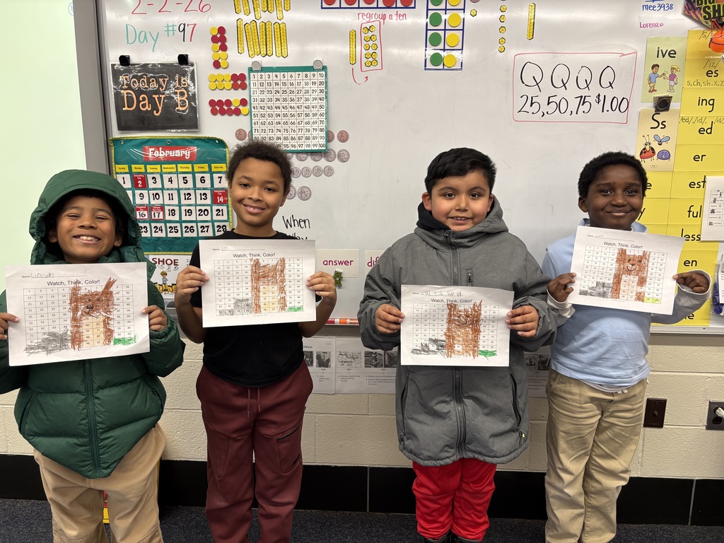 Second graders solve math problems to find a mystery picture of Punxsutawney Phil with his shadow.