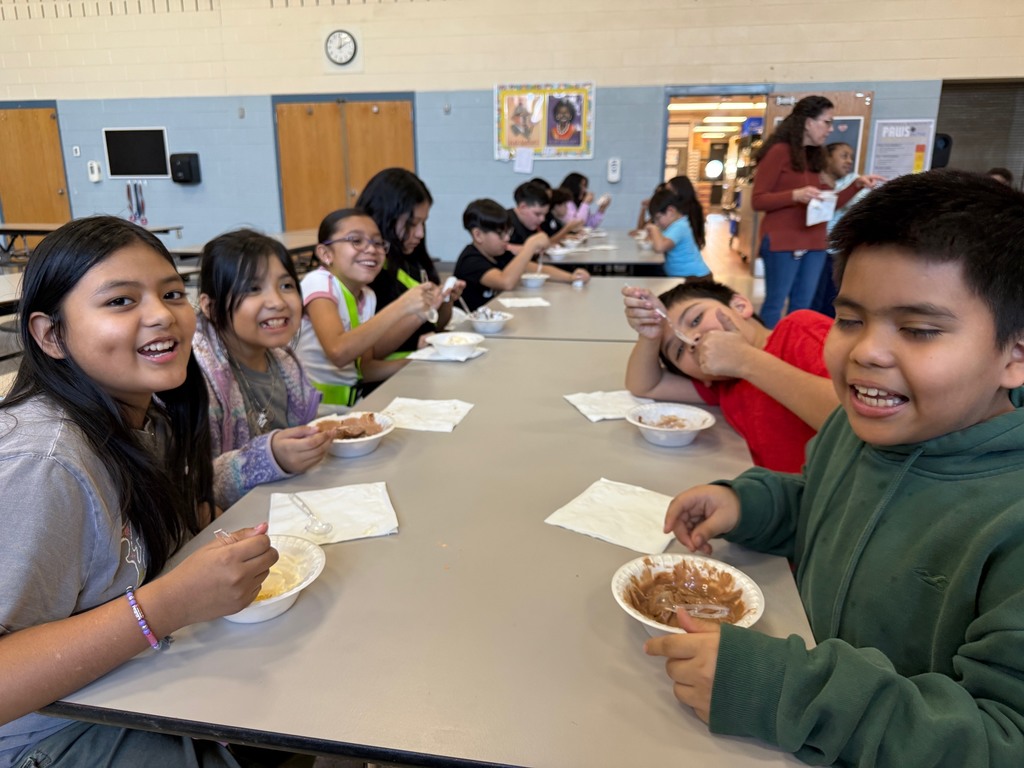 4th Grade students enjoying their ice cream.