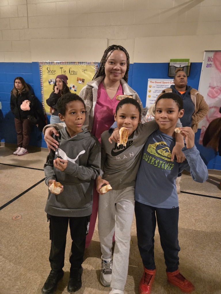 Three siblings and their mom at the dance