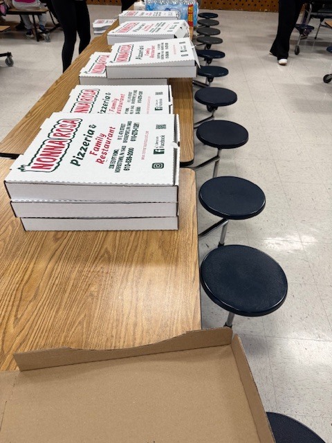 West Norriton Township police officers visit fourth graders and bring pizza for lunch.