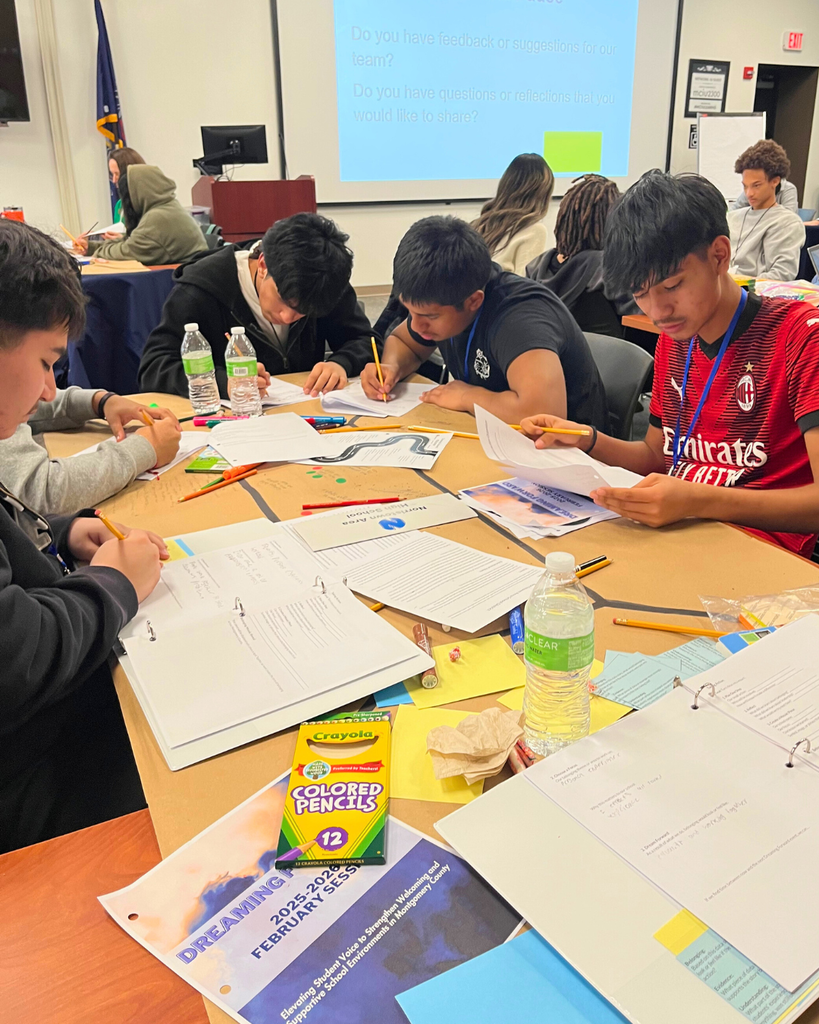 Students working at a table.