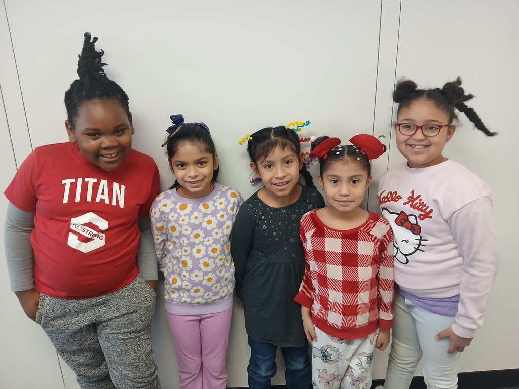 Second grade student celebrating crazy hair day.