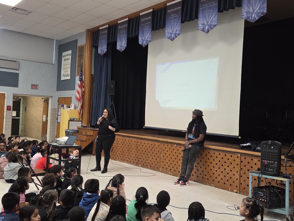 Mrs. White introduces Mr. Brown as the guest speaker.