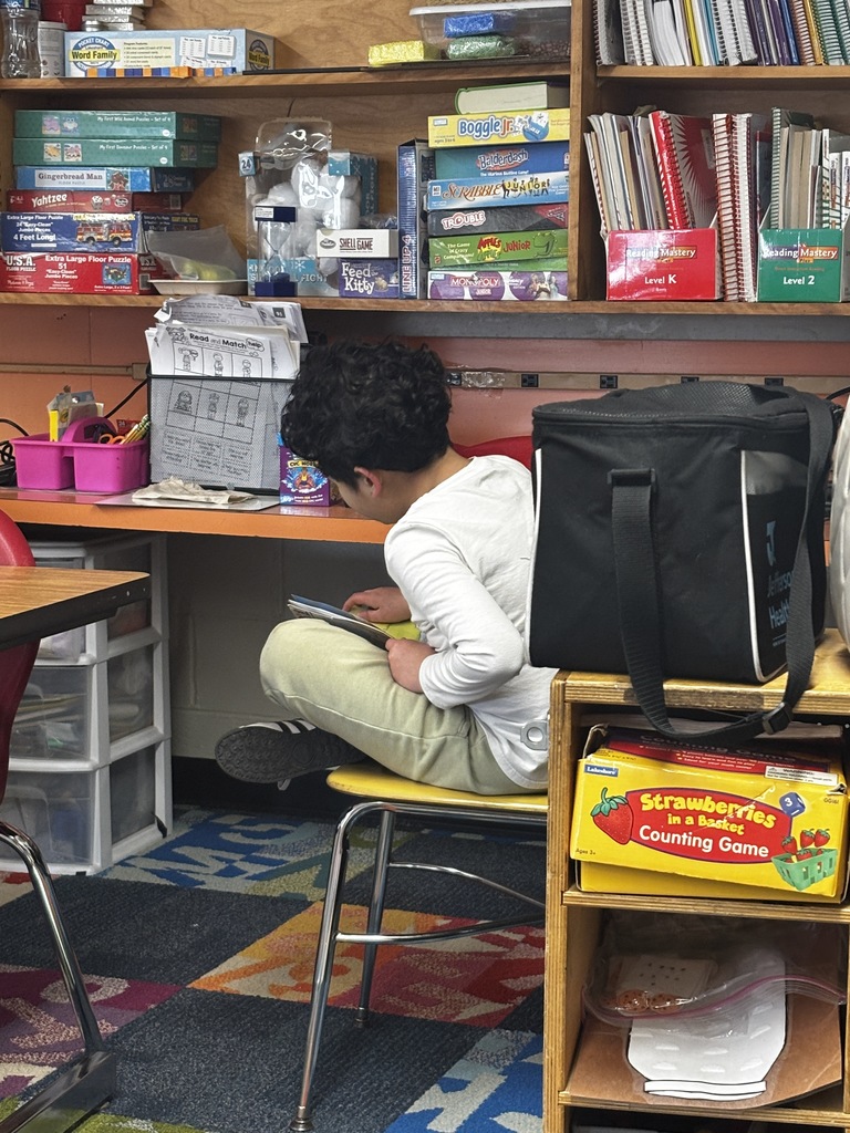 A student reading their new book for Read Across America Week