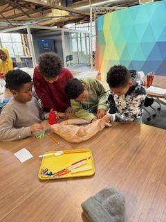 Third graders collaborate on science projects on a Flux Space field trip.