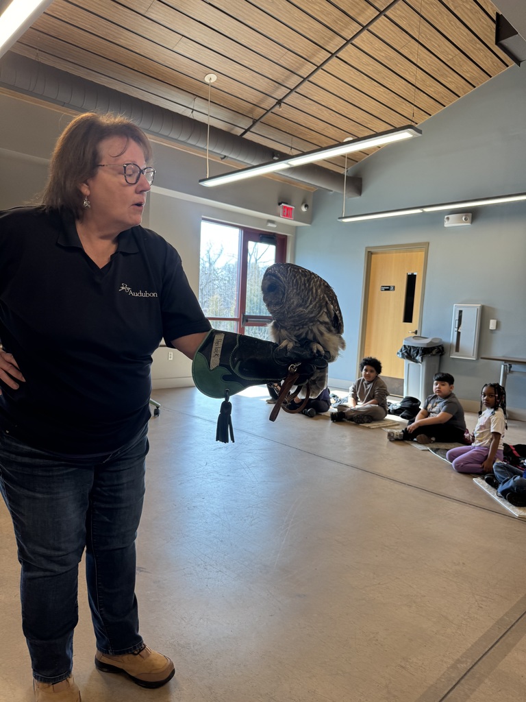 First graders visit the John James Audubon Center and meet an owl.