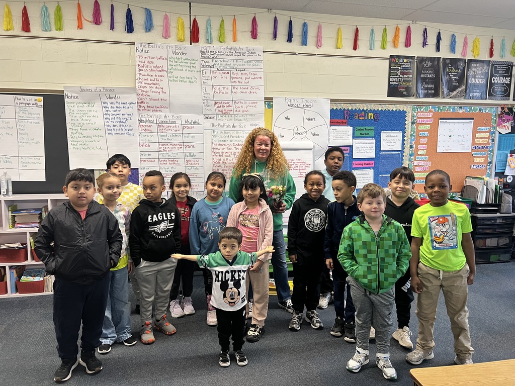 Mrs. Jennifer Yost receives flowers.