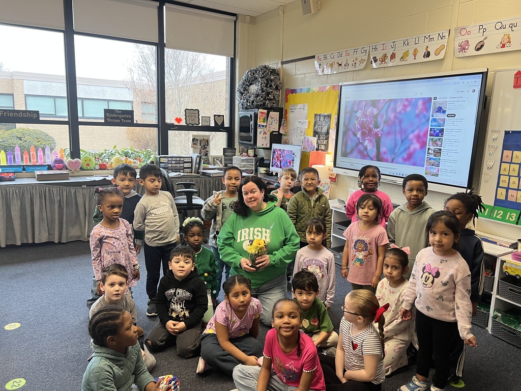 Mrs. Laura Maltman receives flowers.