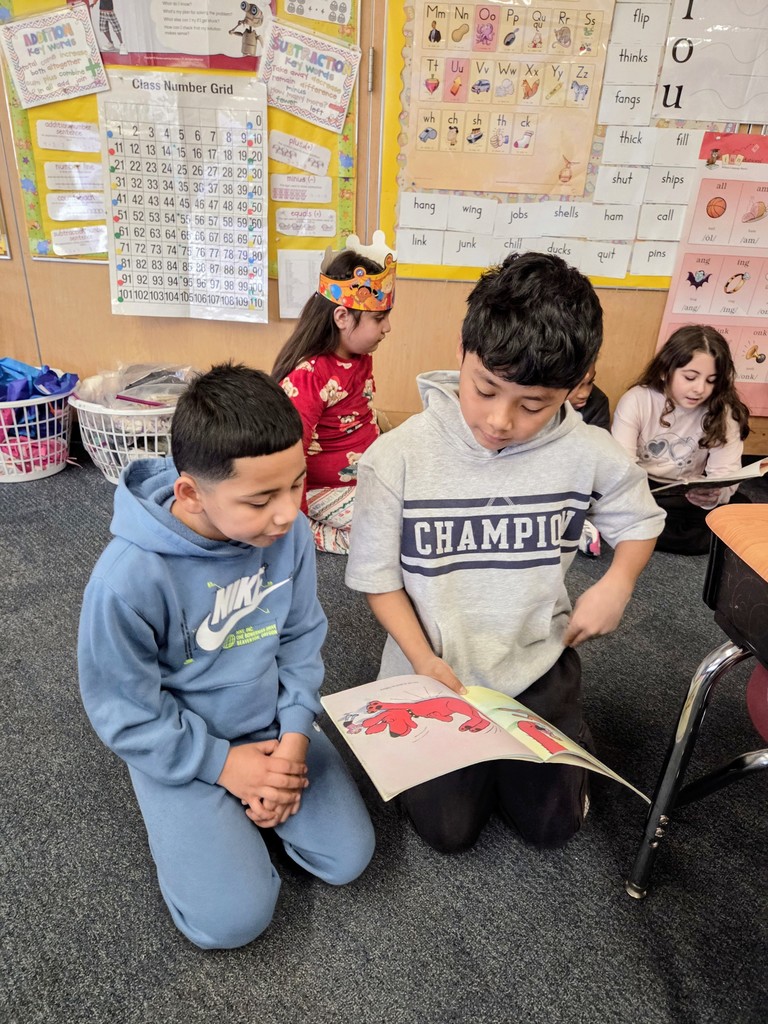 Two students buddy reading together