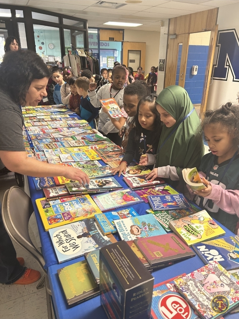 Students at the book giveaway picking new books