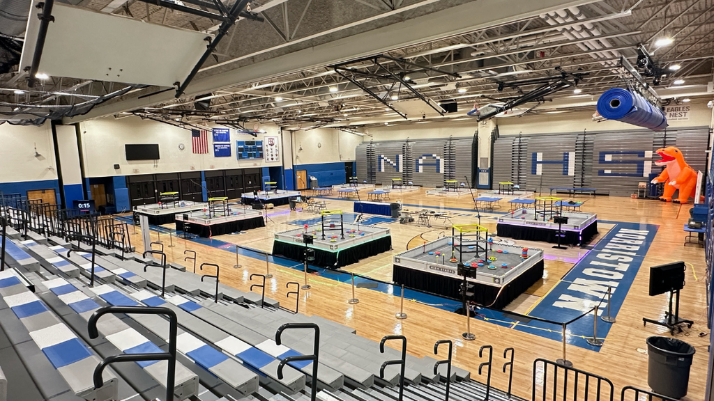 NAHS gym set up with robotics competition game fields. 