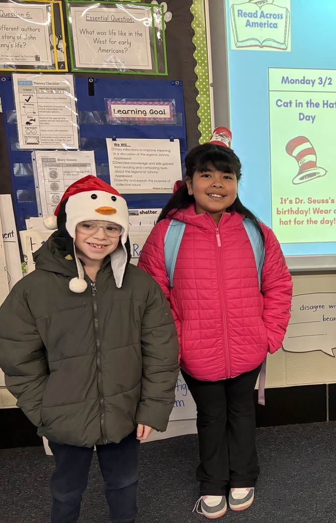 Students wear hats for Cat in the Hat Day.