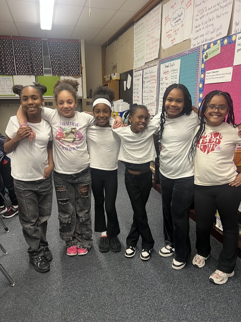 Students dress up as twins for Read Across America.