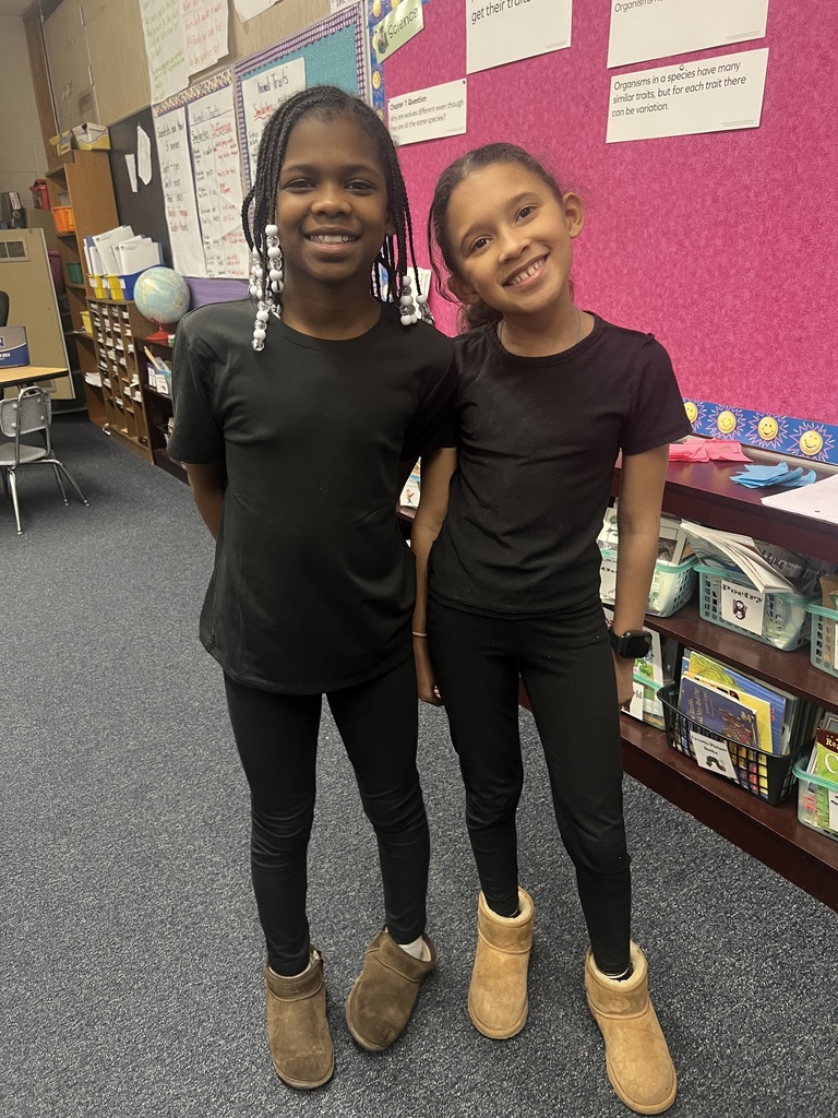 Students dress up as twins for Read Across America.