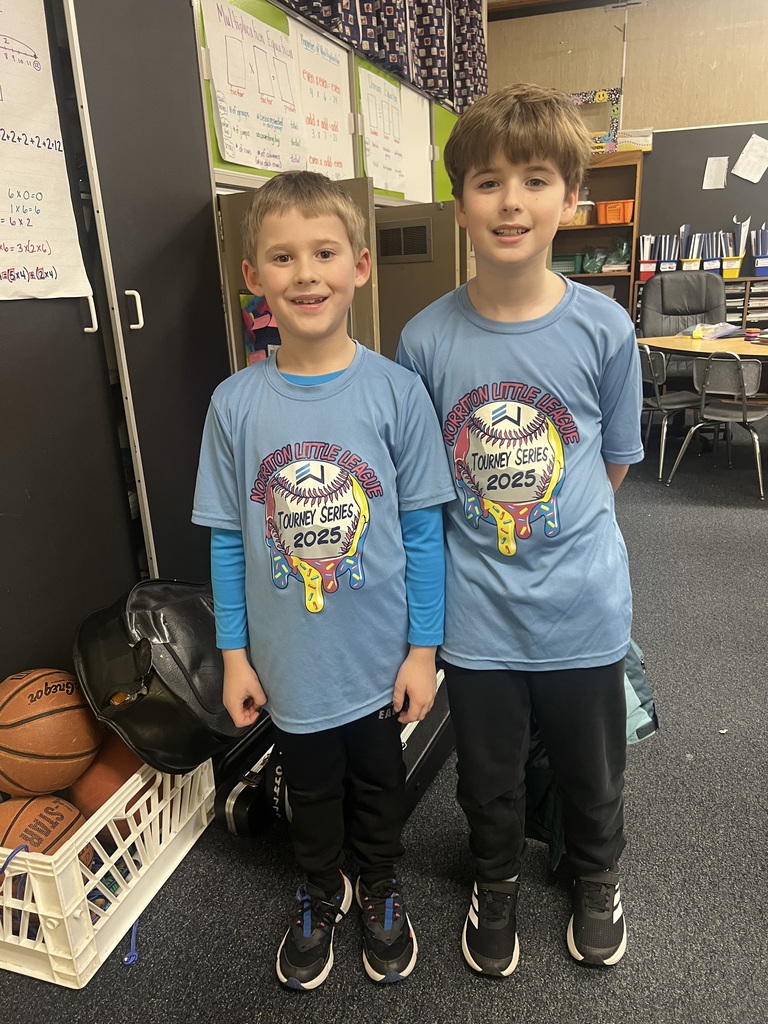 Students dress up as twins for Read Across America.