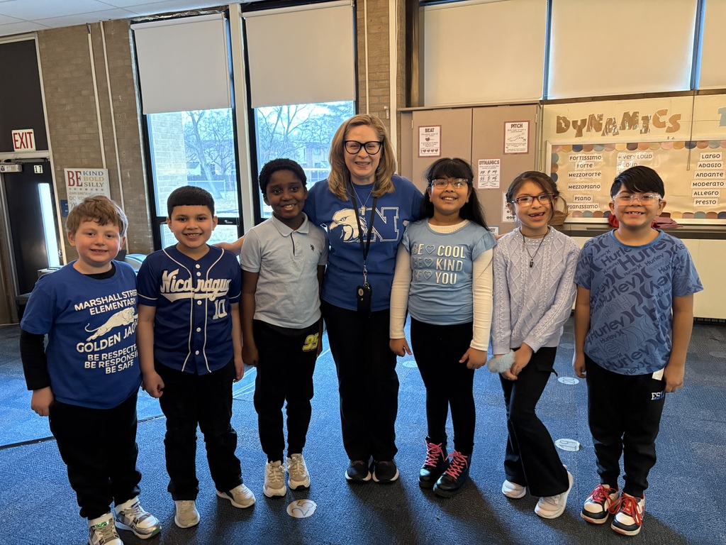 Students dress up as a teacher for Read Across America.